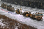 Fairmont Tamper 7110-30 holds down track 8 of the Harvester Yard with 4 friends